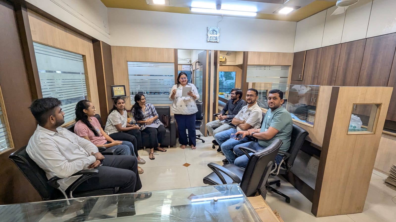 Team gathered for a discussion at the office