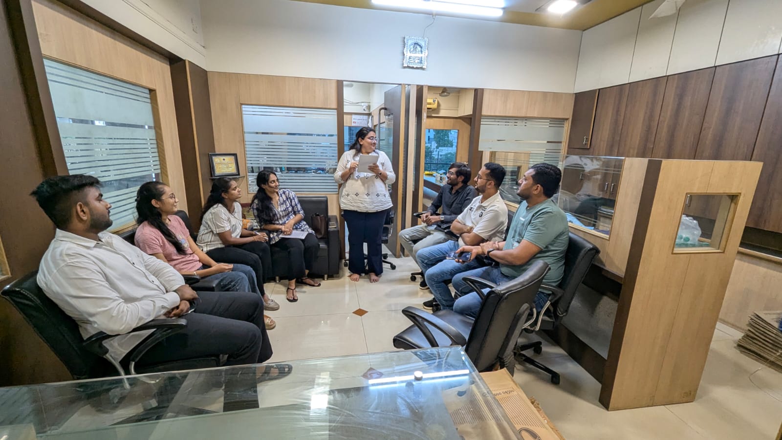 Team members engaged in an interactive office session