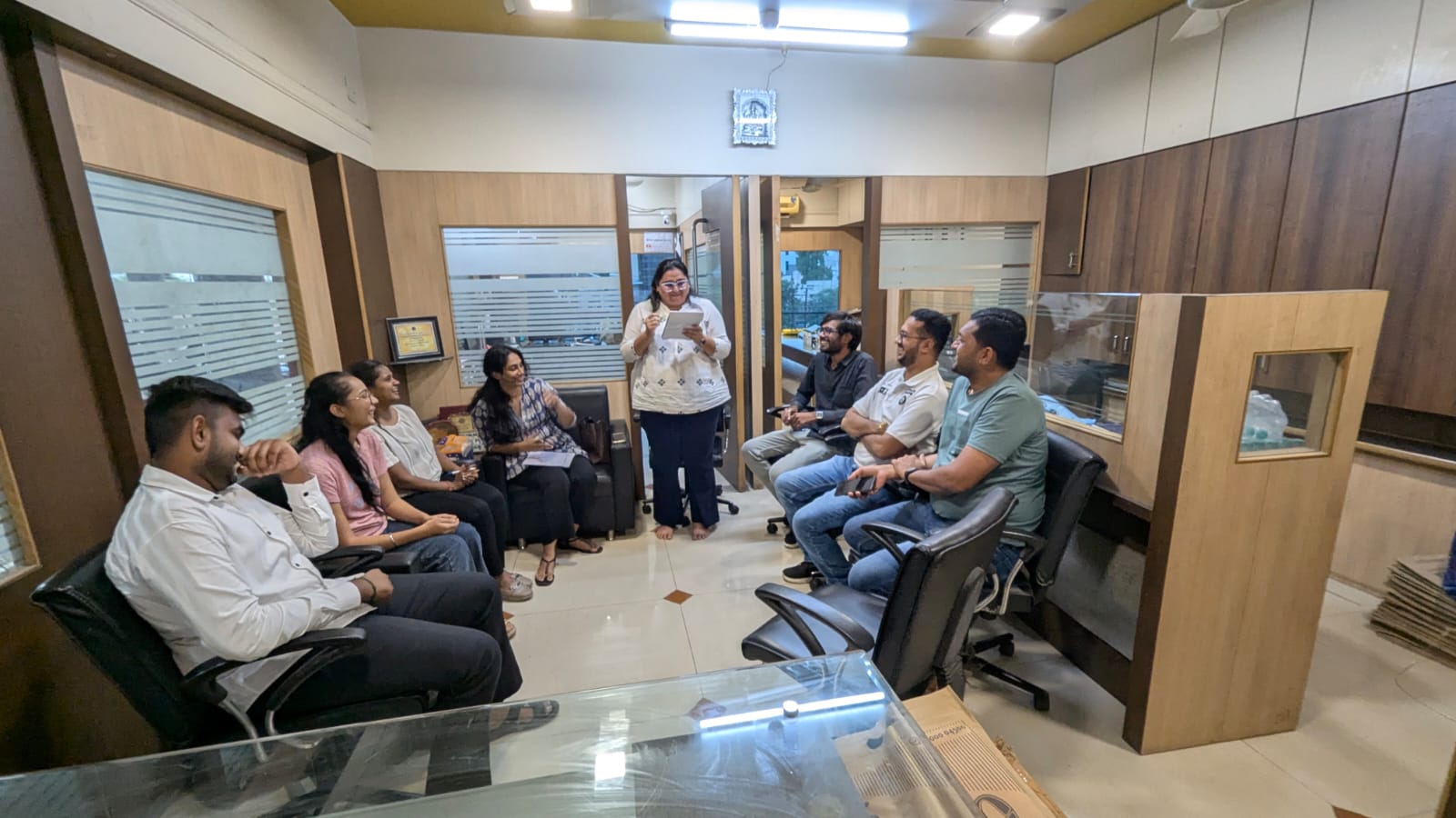 Colleagues sharing ideas during the office event
